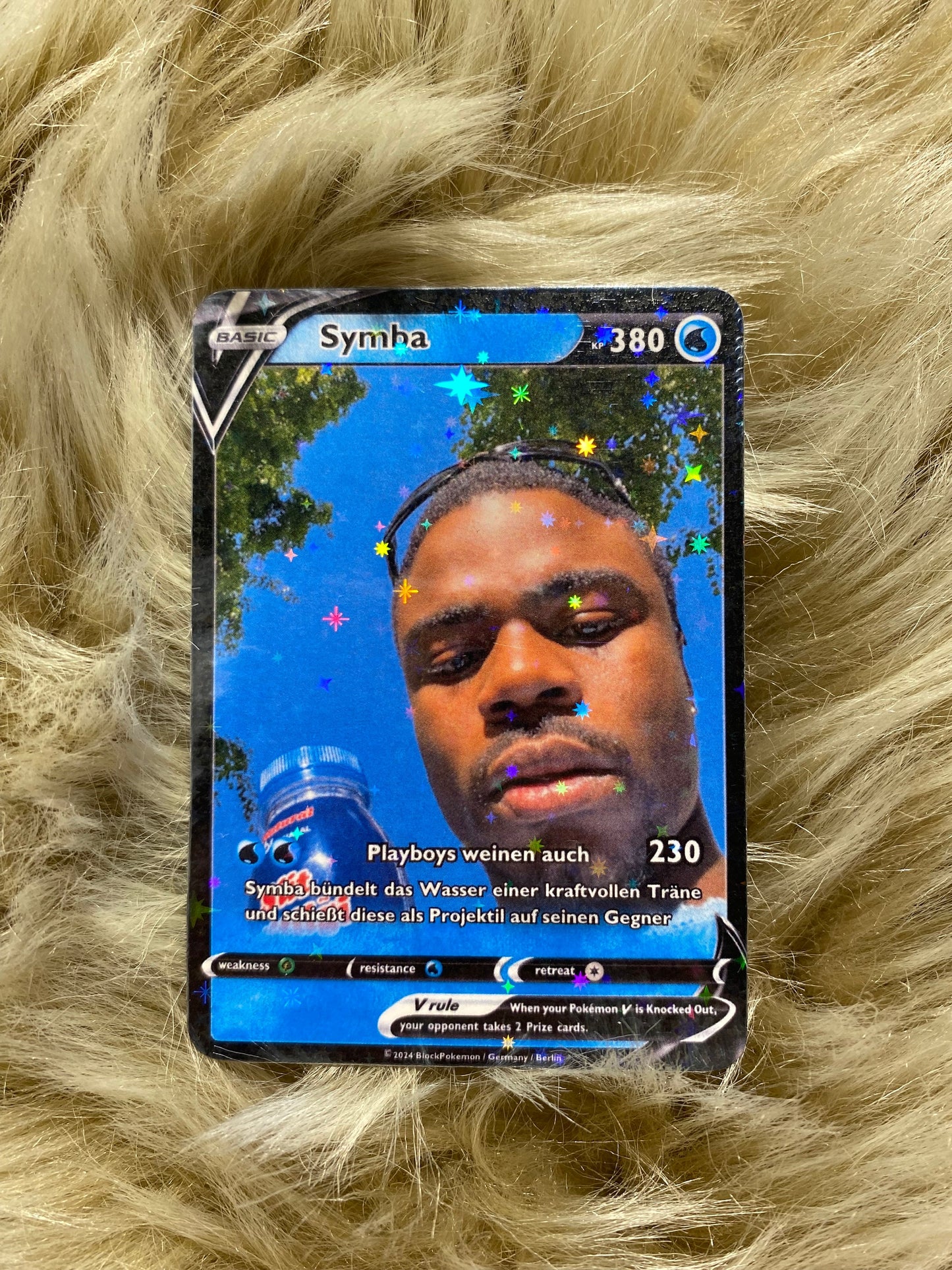 Symba Pokemon-Karte